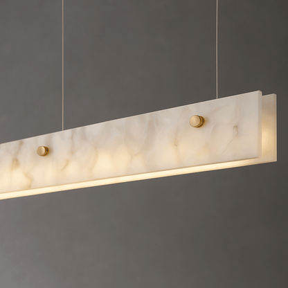 Marble-textured pendant light fixture on a dark gray background