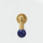 Modern brass knob featuring a deep blue gemstone sphere handle isolated on white background.