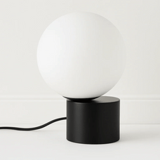 Noctura Brass & Glass Ball table Lamp styled in a bedroom — modern interior by Baskoraa