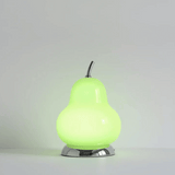 Green pear-shaped lamp on a gray background
