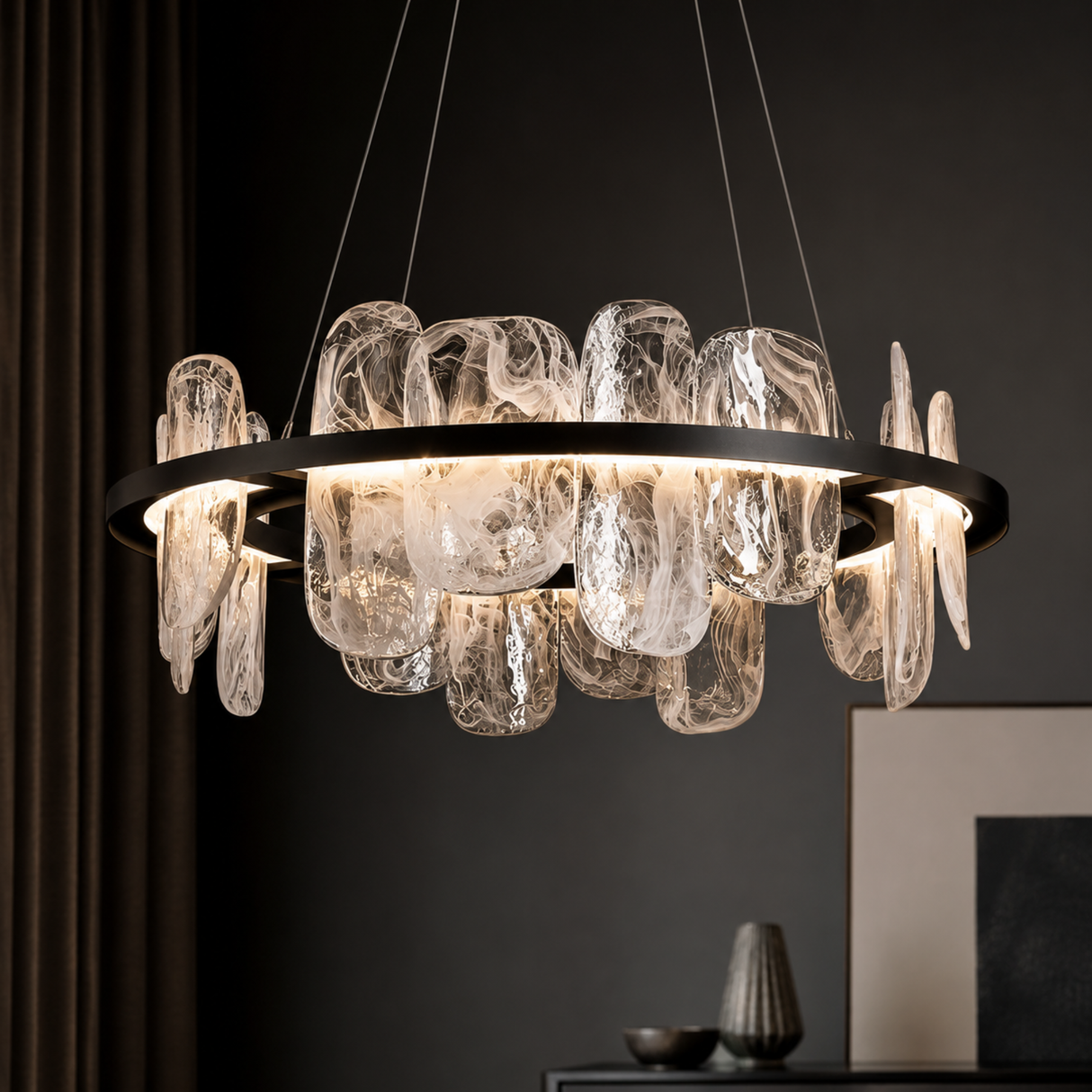 Modern chandelier with glass shades in a dark room