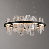 Modern chandelier with glass shades on a gray background