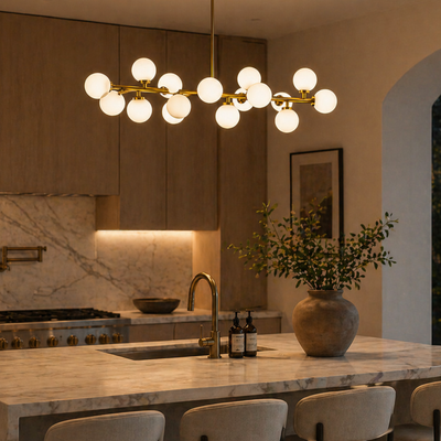 Modern kitchen with marble countertop, pendant light, and decorative vase.