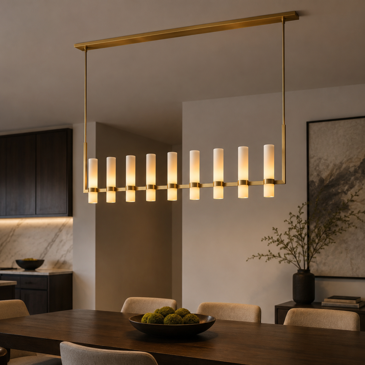 Modern chandelier hanging above a dining table in a stylish room.