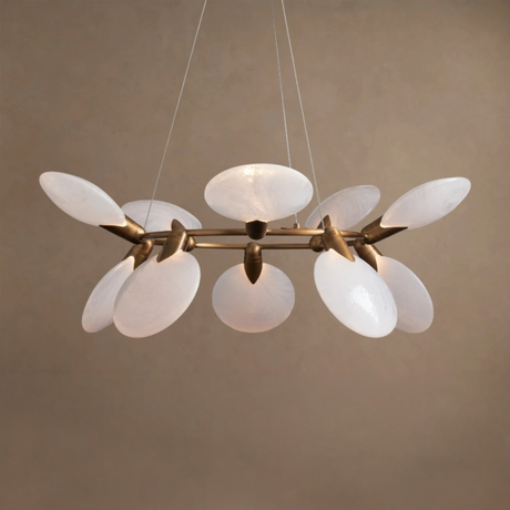 Modern chandelier with white glass shades and gold metal accents on a beige background