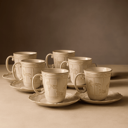 Set of ceramic cups and saucers with intricate designs on a brown background