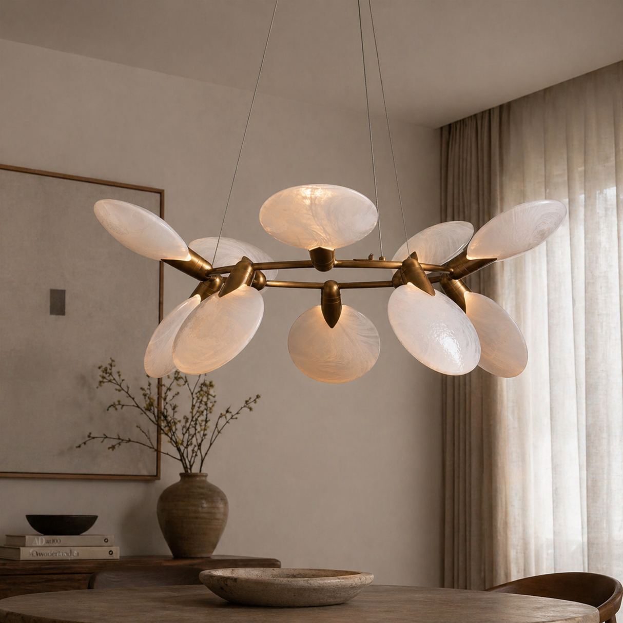 Modern chandelier with white glass shades in a room setting