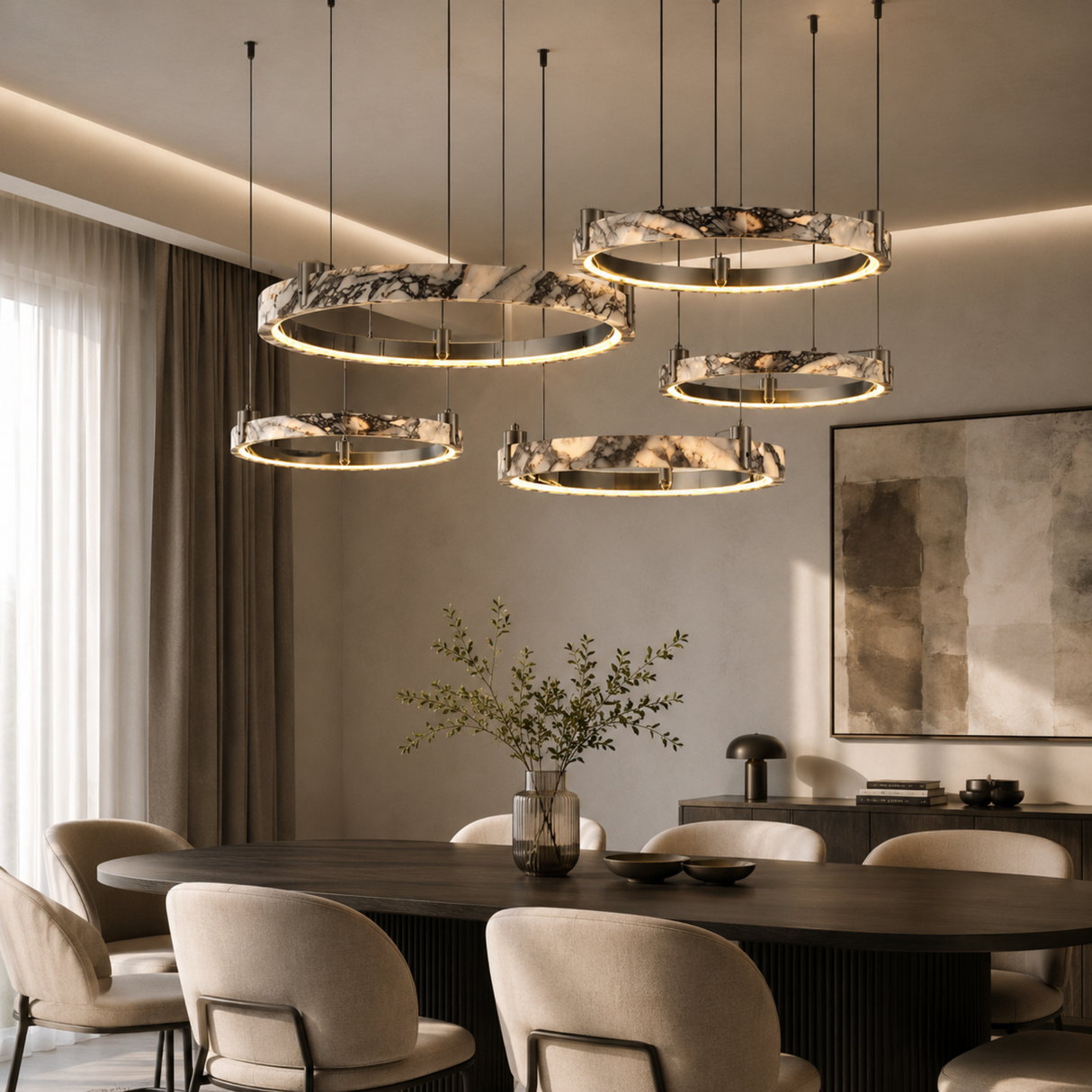 Modern dining room with pendant lights, round table, and chairs.