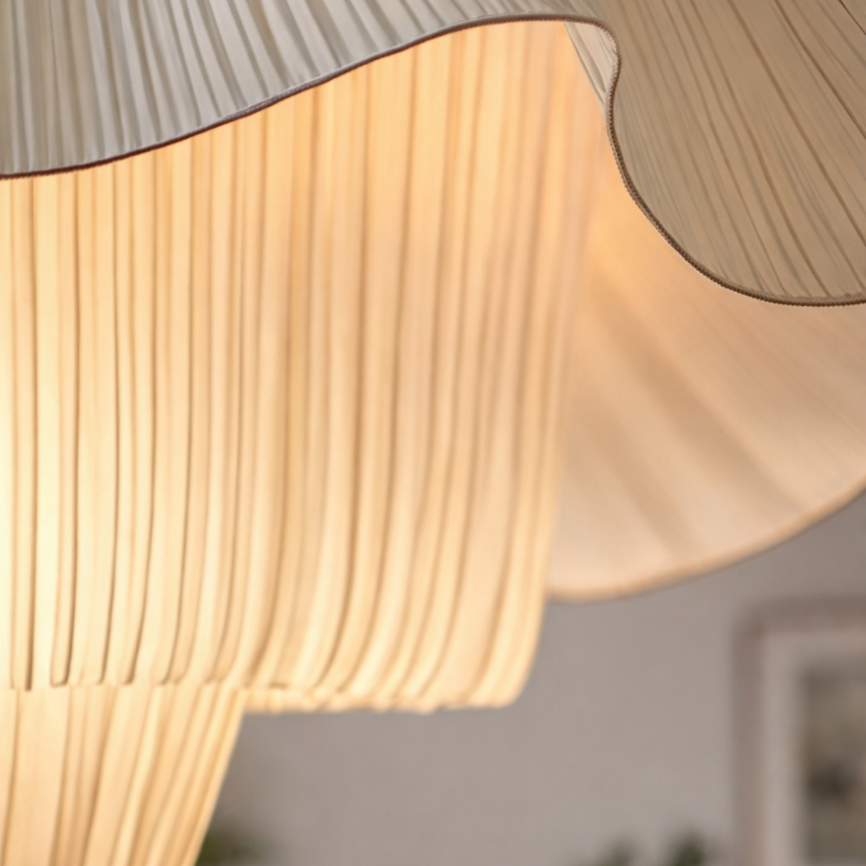 Close-up of a textured lampshade with a blurred background