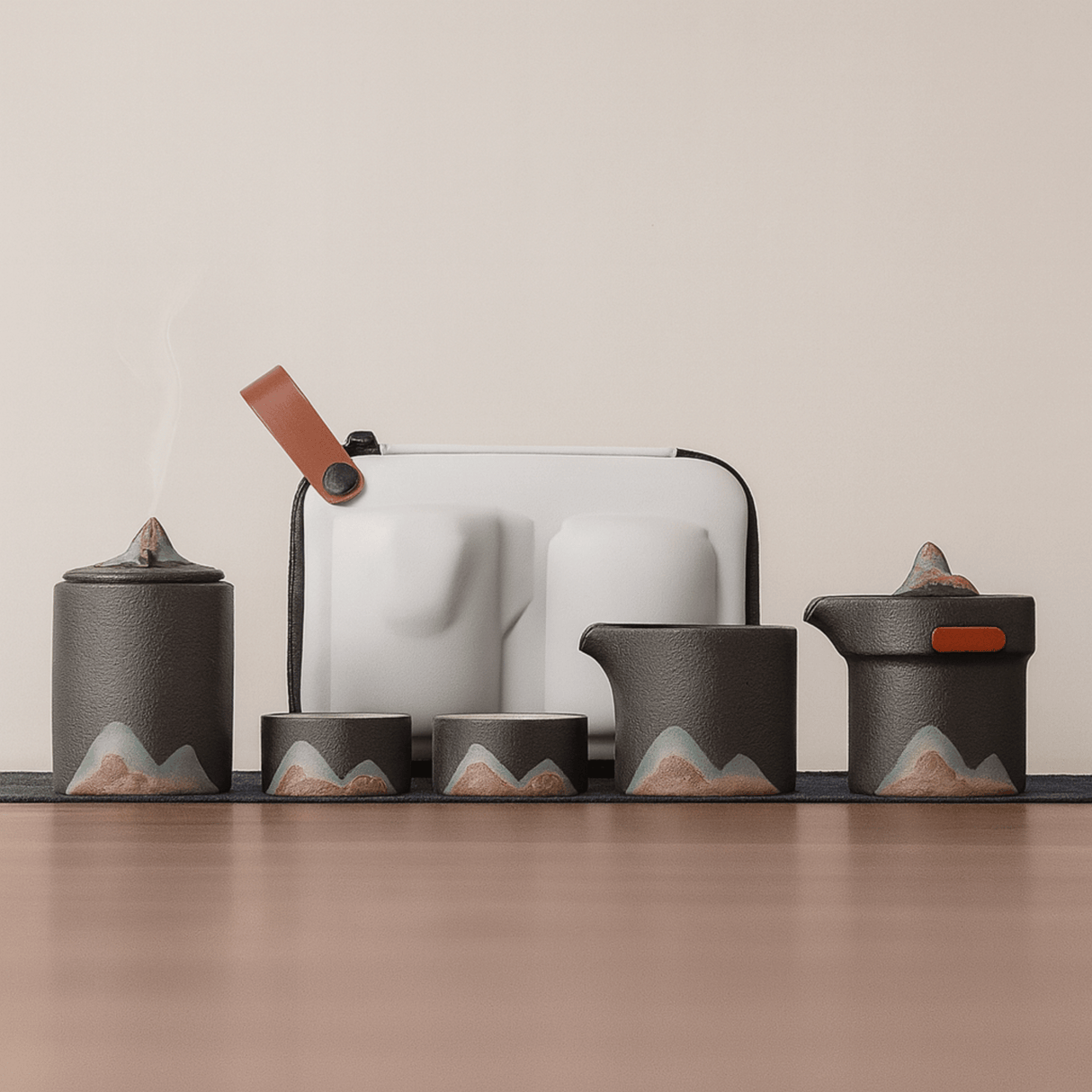 Tea set with mountain designs on a wooden surface and beige background