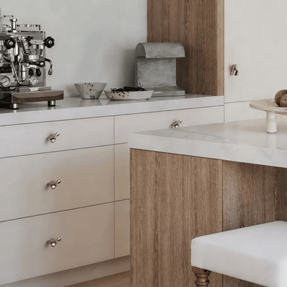 Modern kitchen with white countertops and wooden cabinets