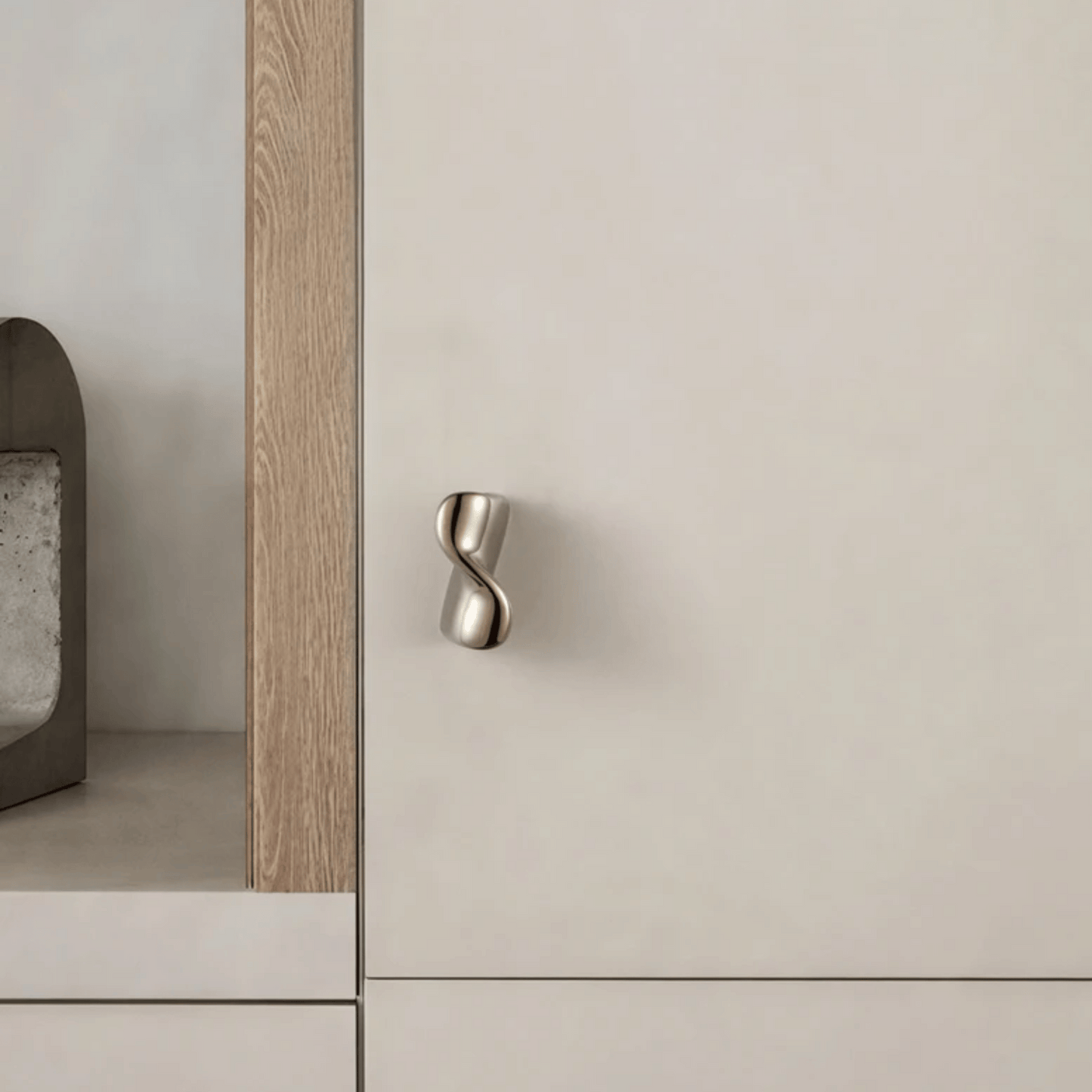 Cabinet with a modern handle on a neutral background