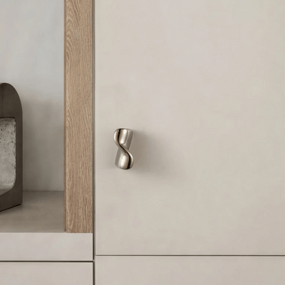 Cabinet with a modern handle on a neutral background