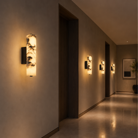 Modern hallway with wall-mounted lamps casting a warm glow.