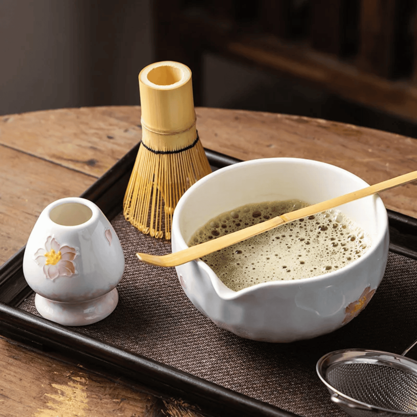 Traditional Japanese tea-making set on a wooden table