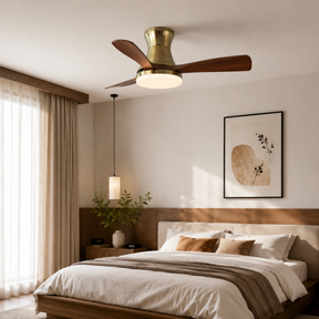 Modern bedroom with a ceiling fan, bed, and wall art.