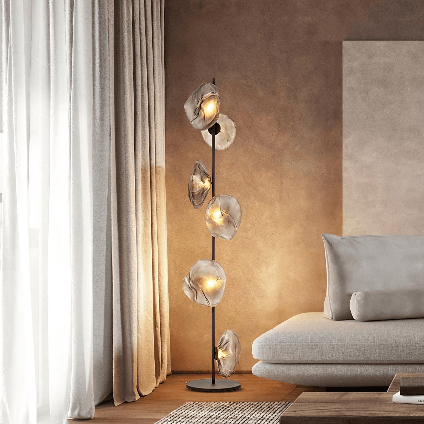Modern floor lamp with glass shades in a living room setting.