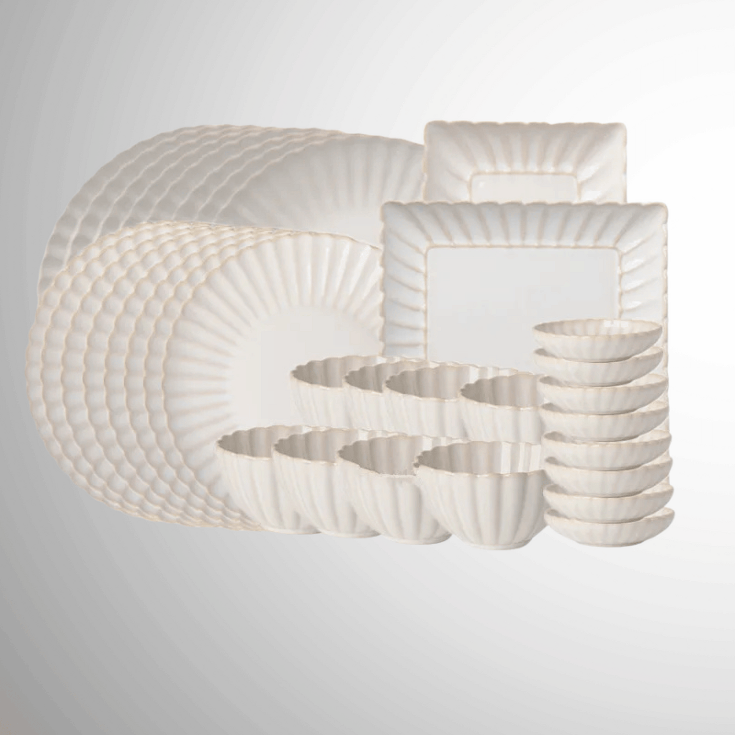 Set of white ceramic plates with textured design on a light gray background