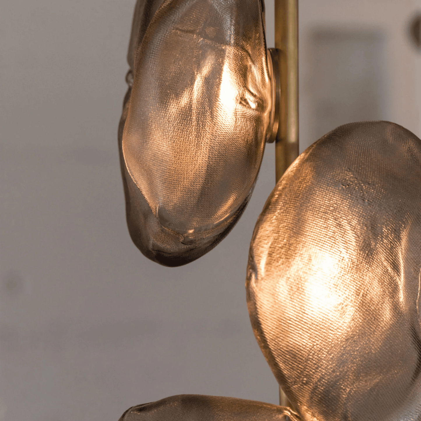 Close-up of a textured gold object with a blurred background