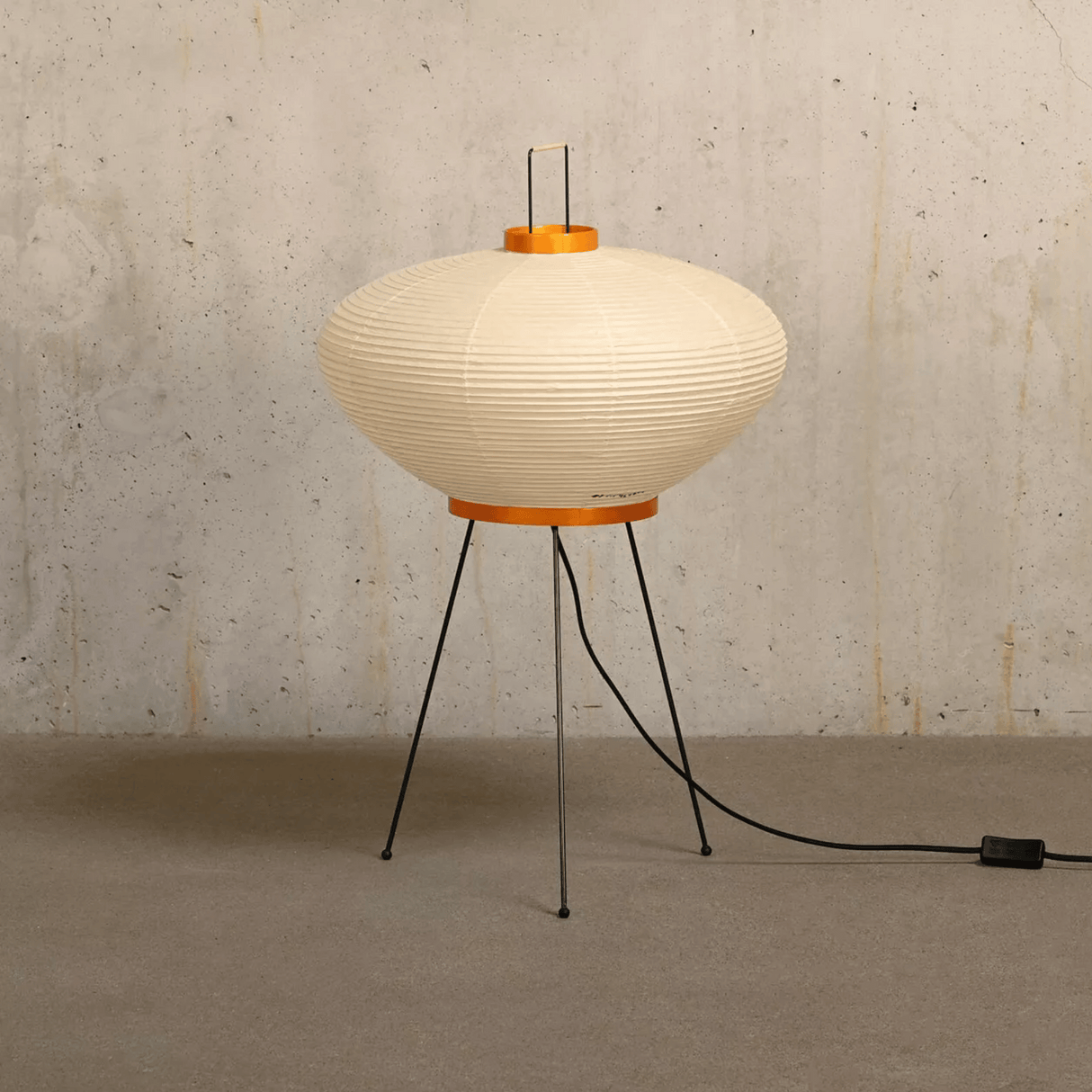 Modern floor lamp with ribbed design on a textured wall background