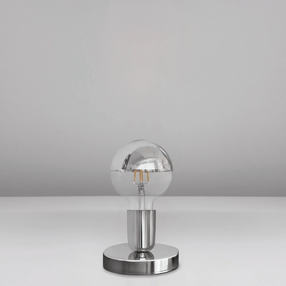 Silver spherical lamp on a gray background