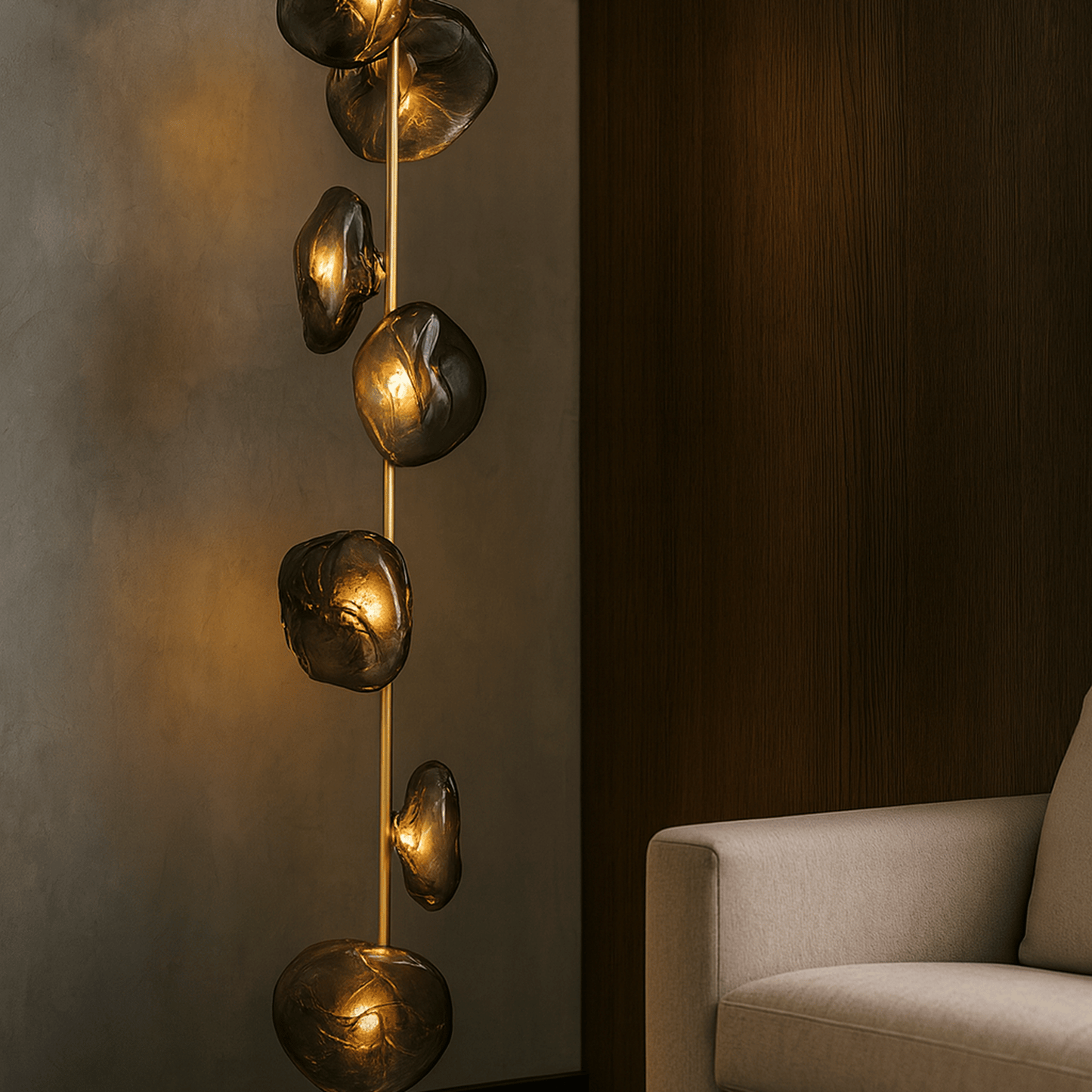 Decorative wall light fixture with gold accents in a room setting.