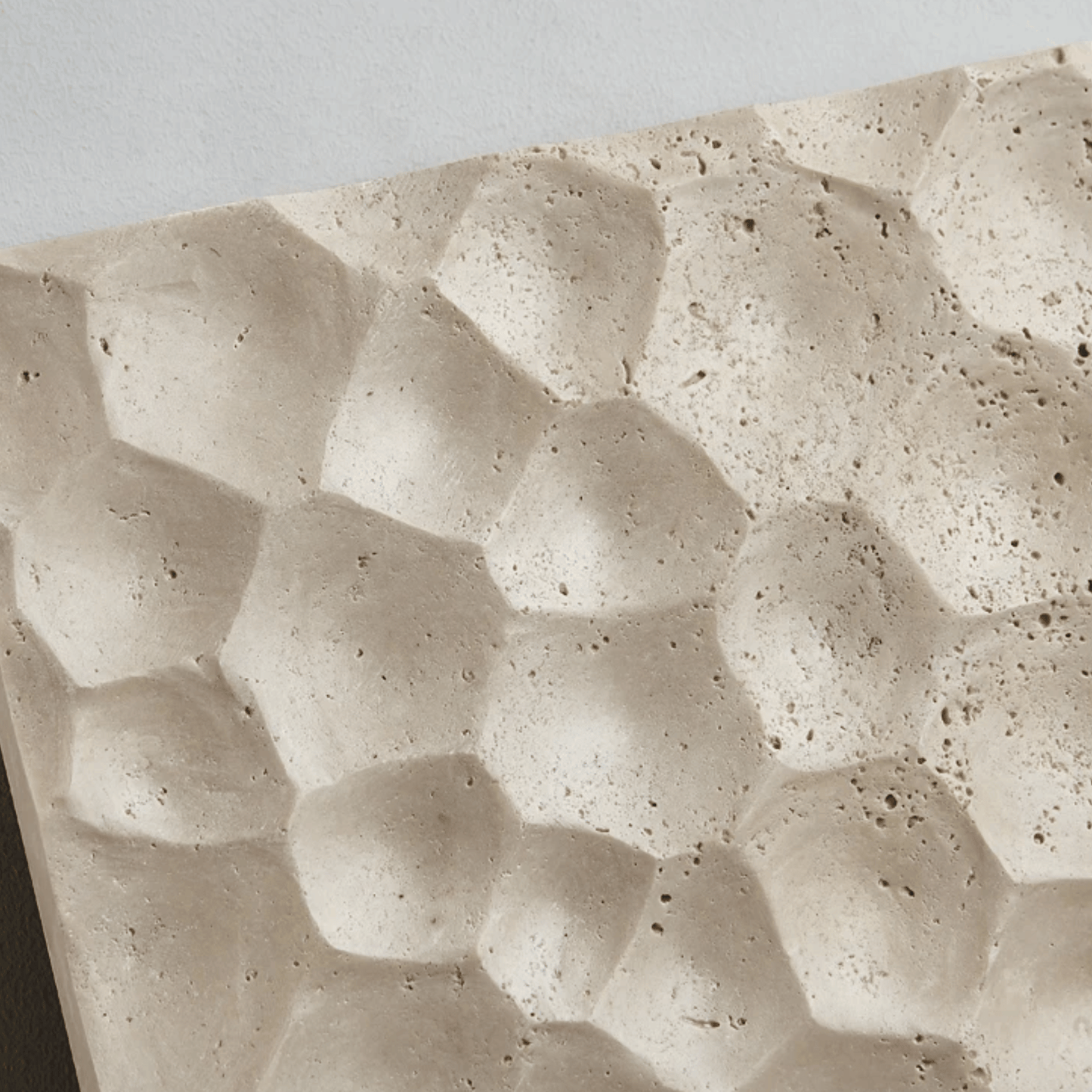 Close-up of textured stone surface with wavy pattern