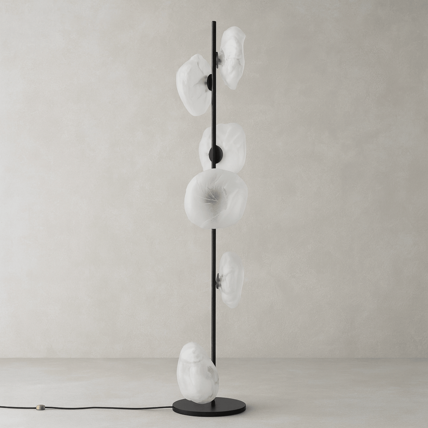 Modern floor lamp with white glass shades on a neutral background