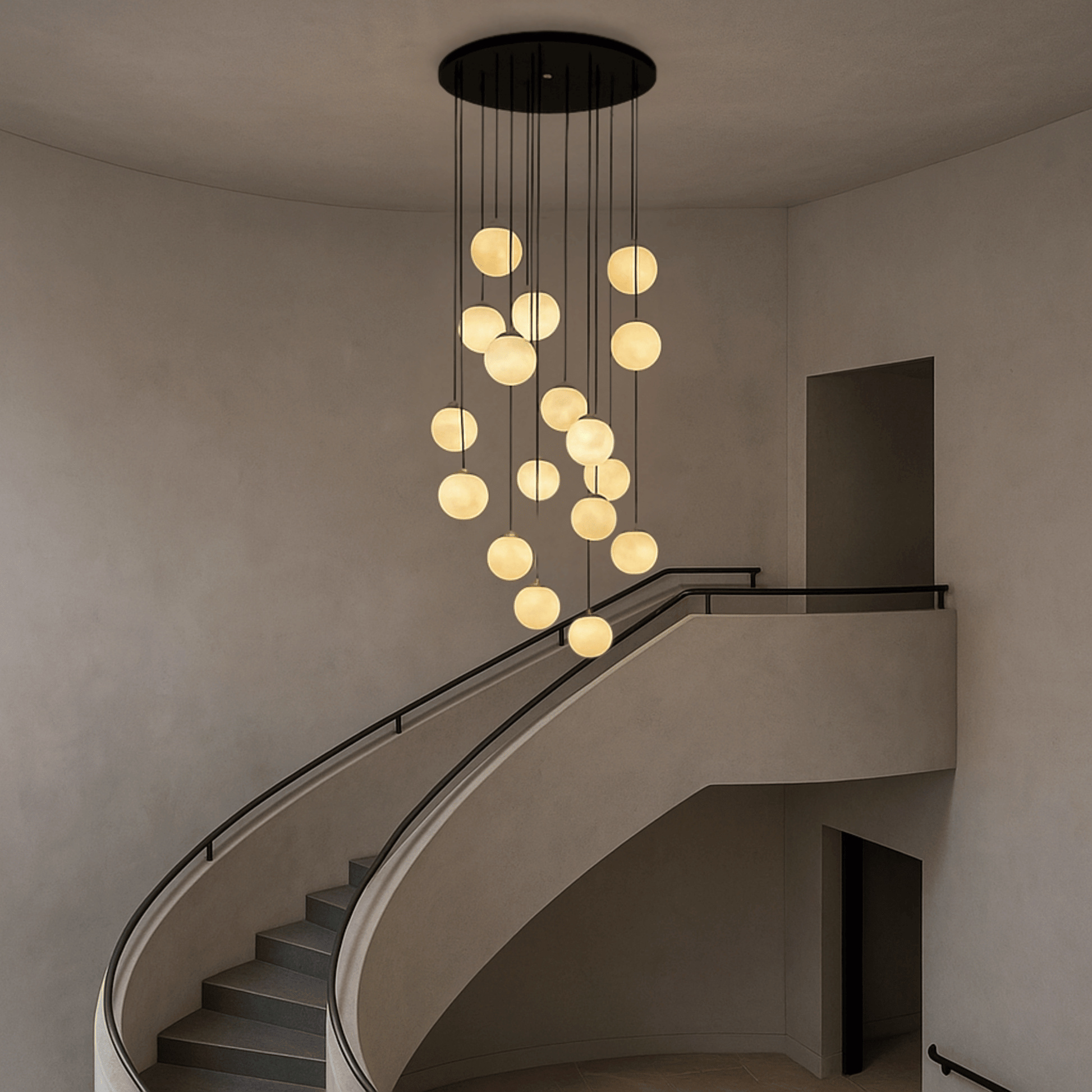 Modern chandelier hanging above a staircase in a minimalistic interior.