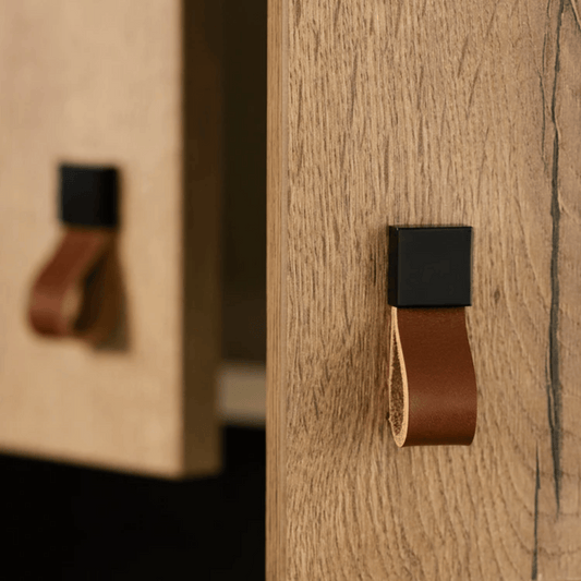 Wooden furniture with leather straps and black hooks
