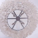 Ceiling fan with light fixture on a white background