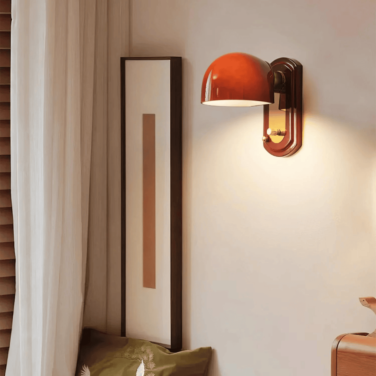 Wall-mounted lamp with a warm glow in a room setting