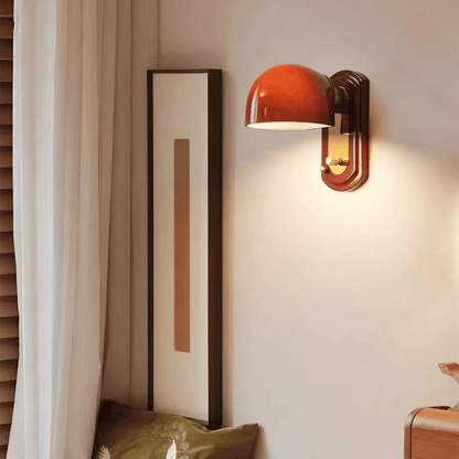 Wall-mounted lamp with a warm glow in a room setting