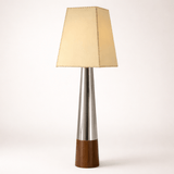 Table lamp with a wooden base, silver middle section, and beige fabric shade on a white background