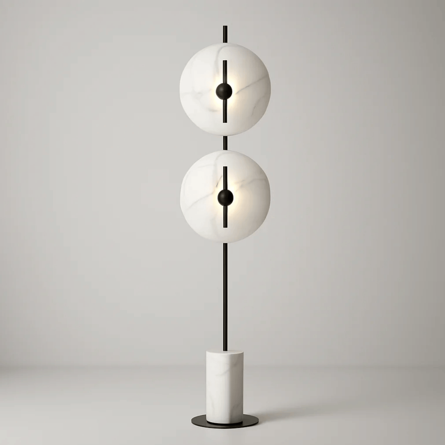 Modern floor lamp with two spherical white shades and a black central rod on a light gray background
