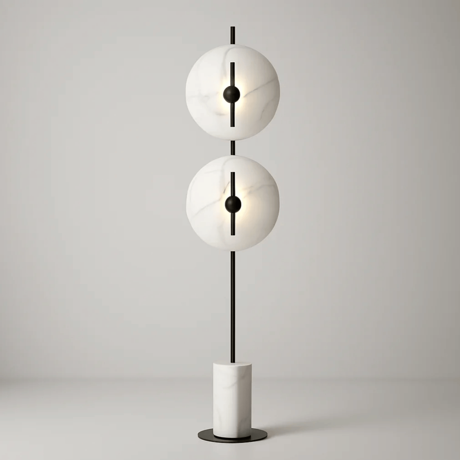 Modern floor lamp with two spherical white shades and a black central rod on a light gray background