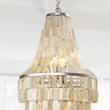 Chandelier with shell-like design on a white background