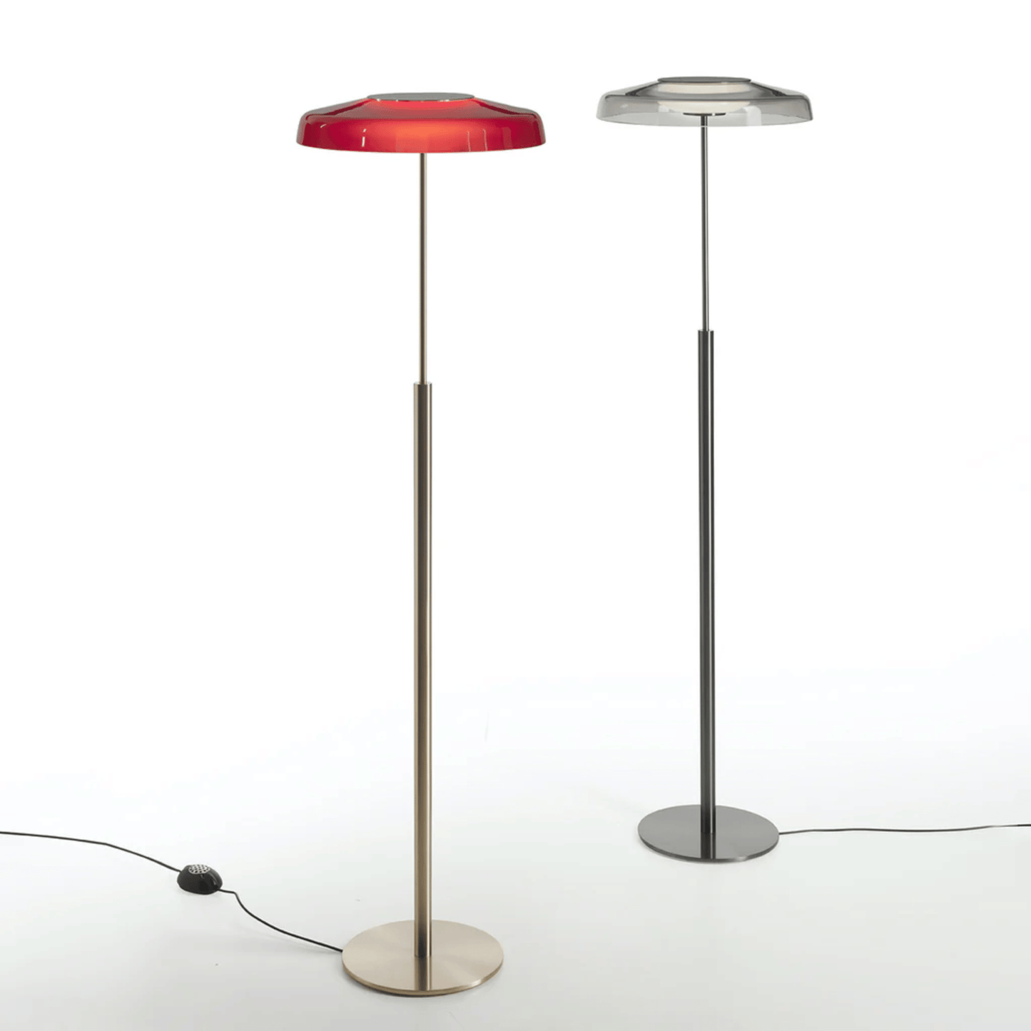 Two floor lamps with red and silver hexagonal shades on a white background
