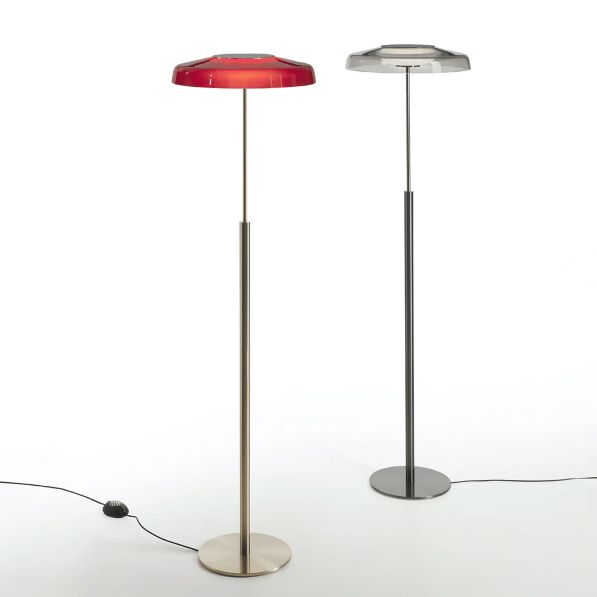 Two floor lamps with red and silver hexagonal shades on a white background