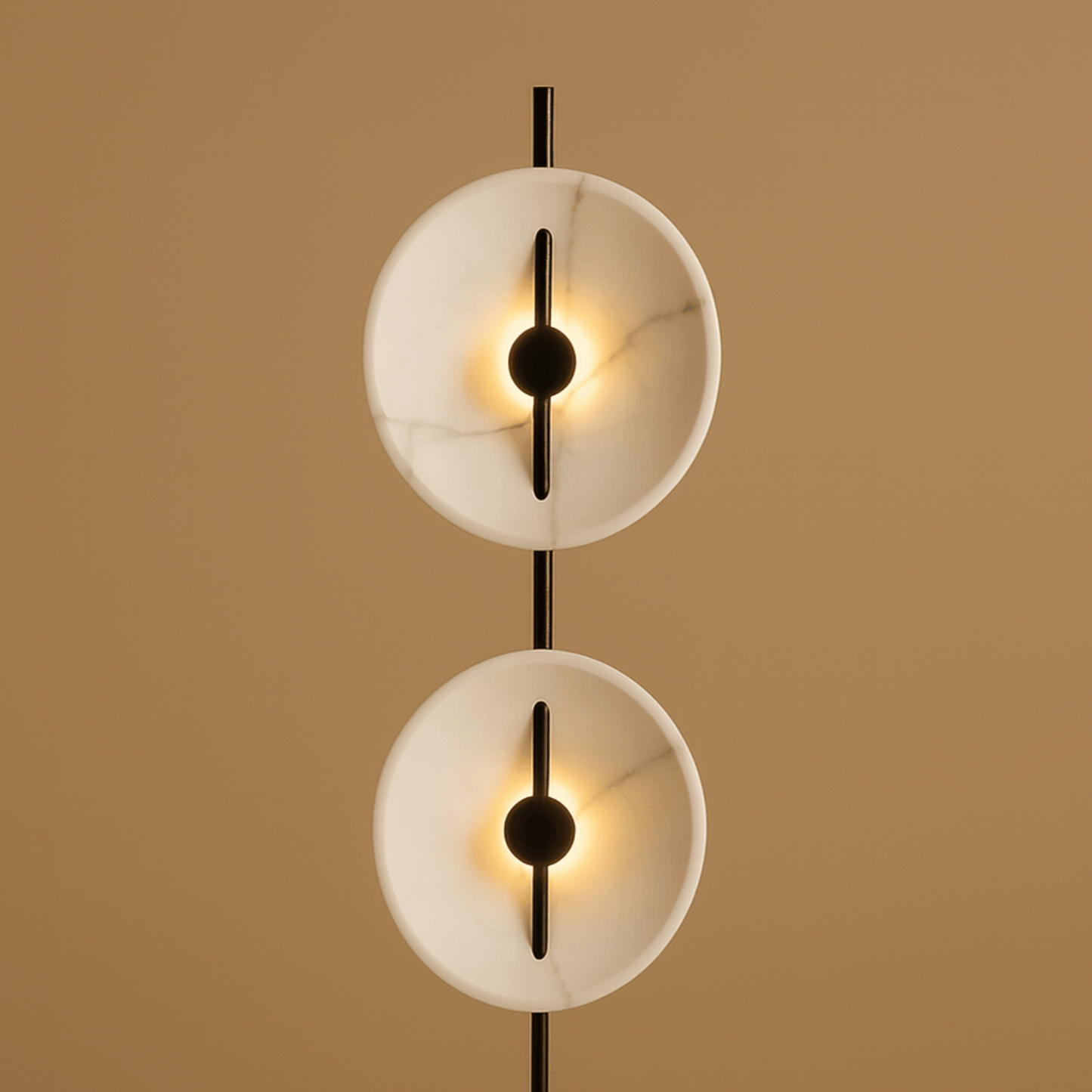 Modern wall lamp with two circular shades on a beige background