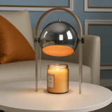 Modern lamp with a candle on a table in a living room setting