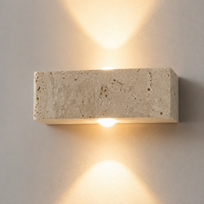 Concrete wall light fixture on a neutral background