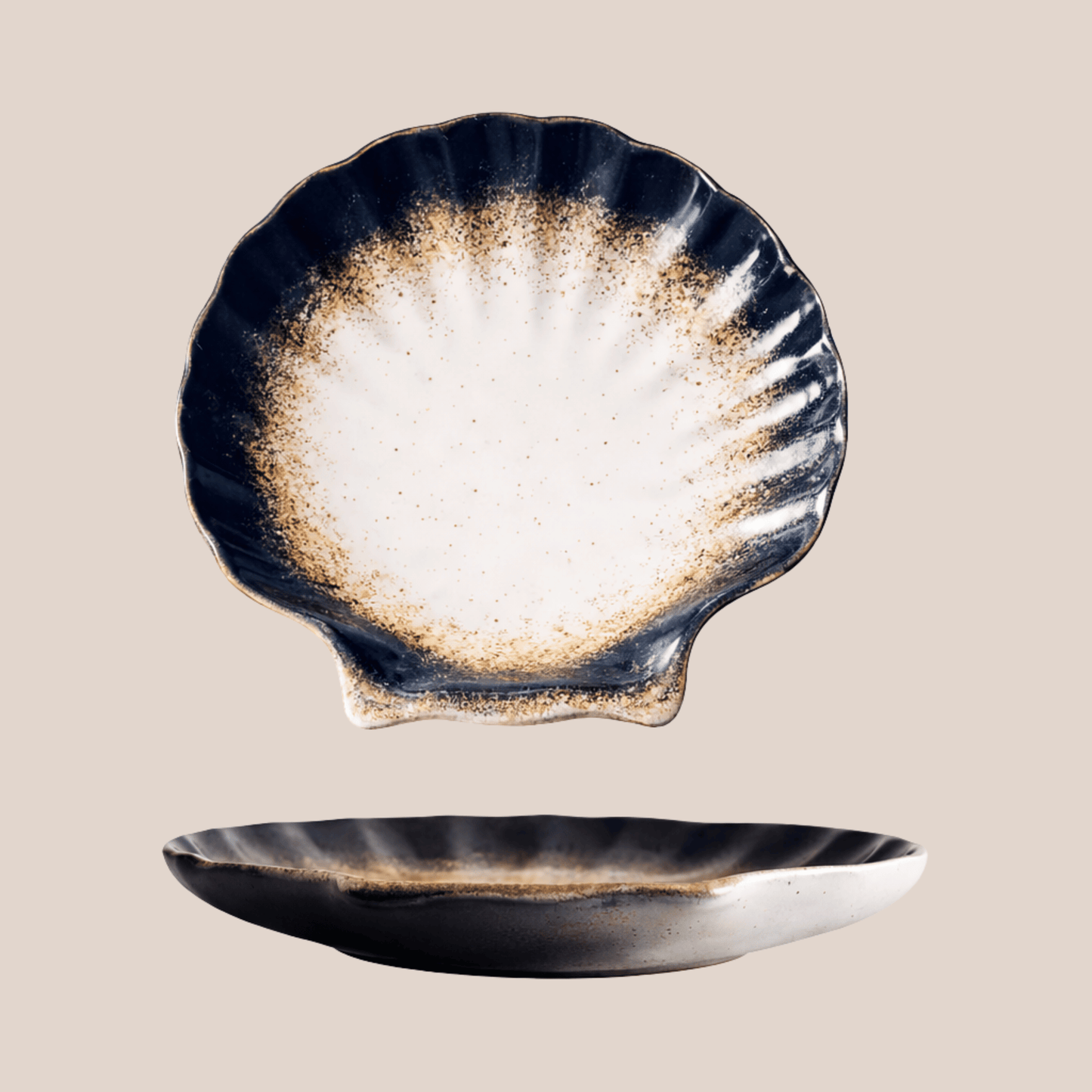 Ceramic shell-shaped dish with a textured surface on a beige background