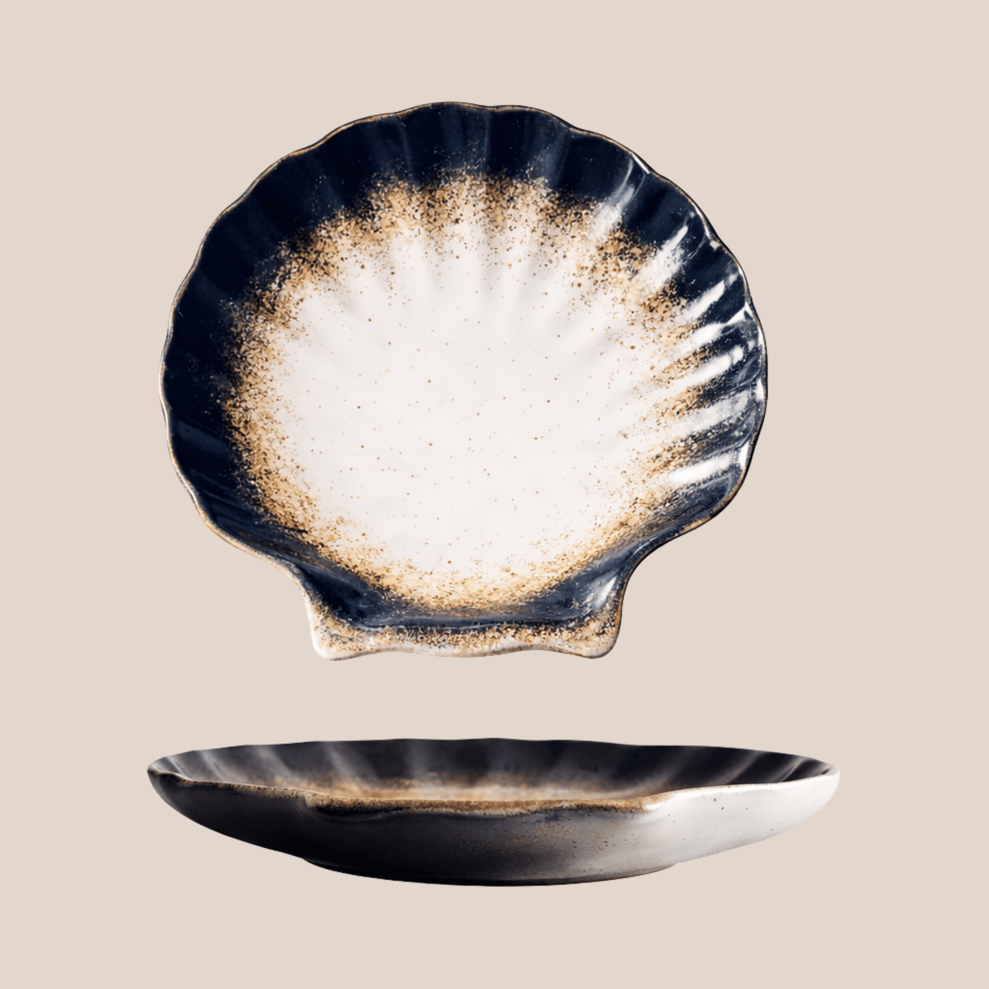 Ceramic shell-shaped dish with a textured surface on a beige background
