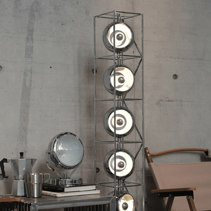 Modern floor lamp with circular design in a room setting