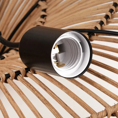 Close look at Nordic Umbrella Handmade Rattan Lamp bulbs installation 