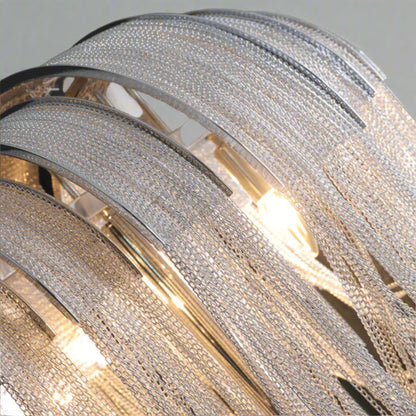 Close-up of a textured metallic strip with a reflective surface