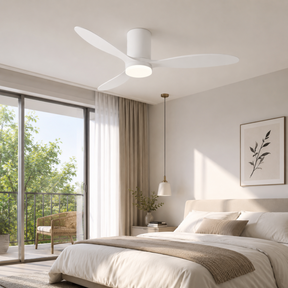 Modern bedroom with a ceiling fan, bed, and large windows.