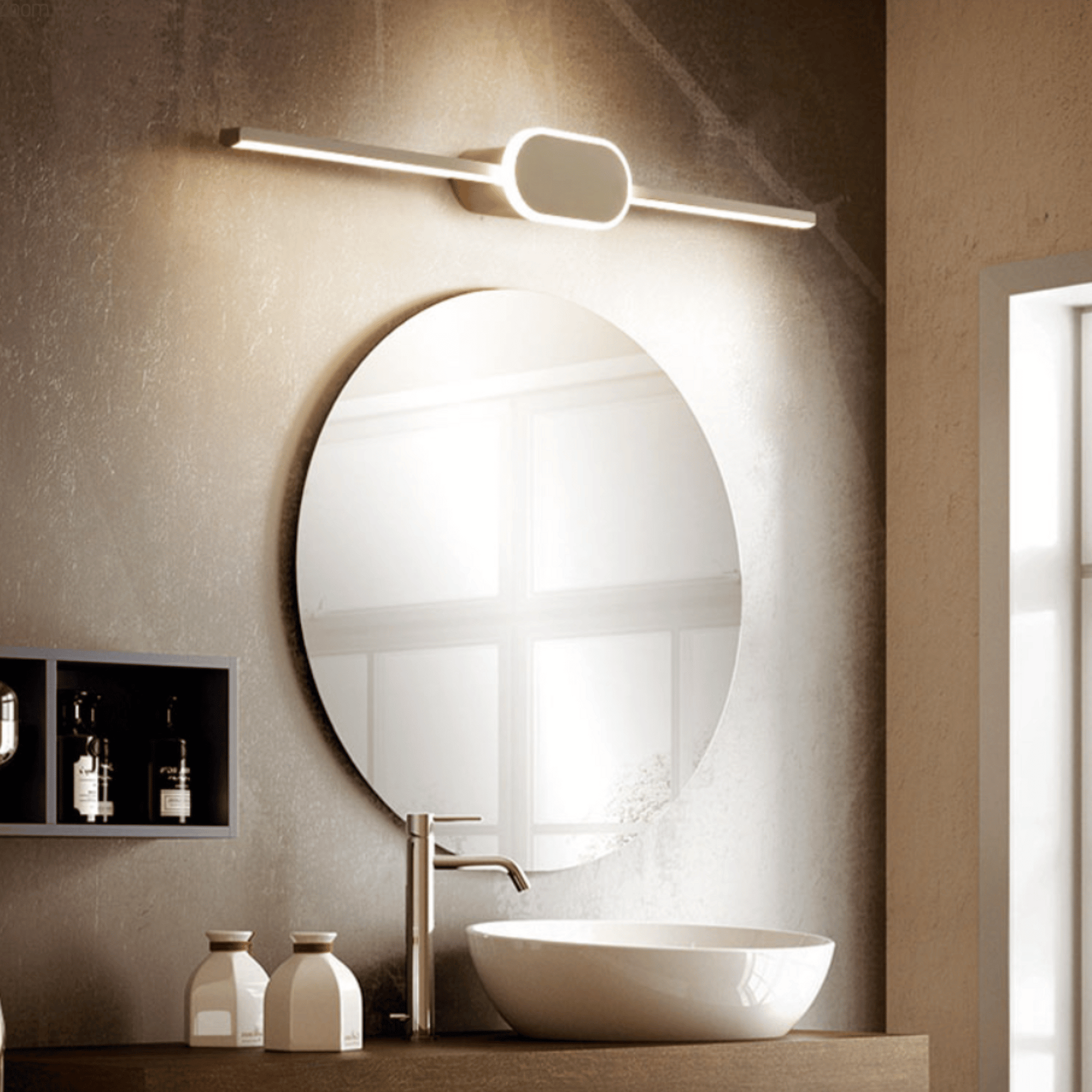 Modern bathroom vanity with round mirror, light fixture, and sink.