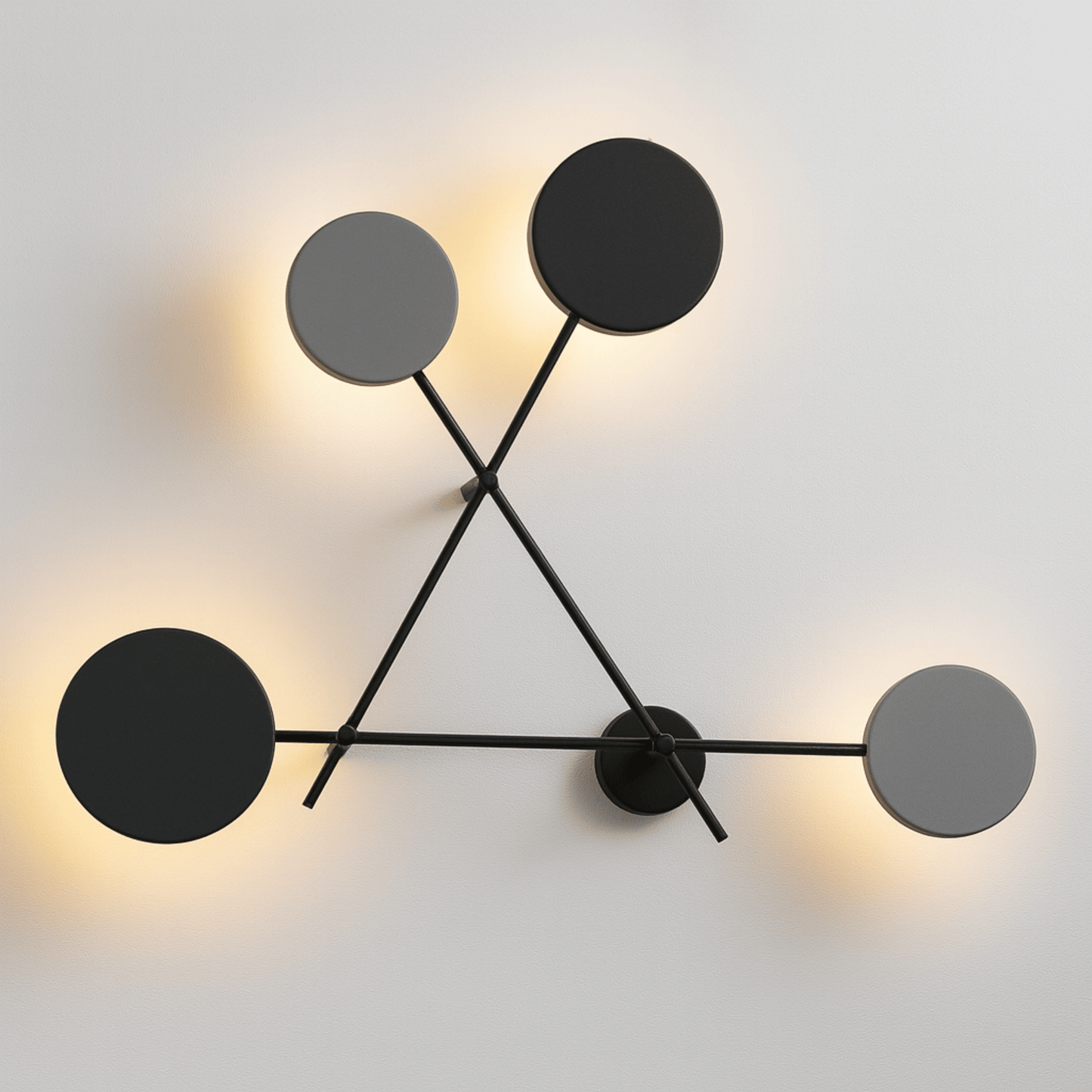Modern wall light fixture with black circular shades on a white background